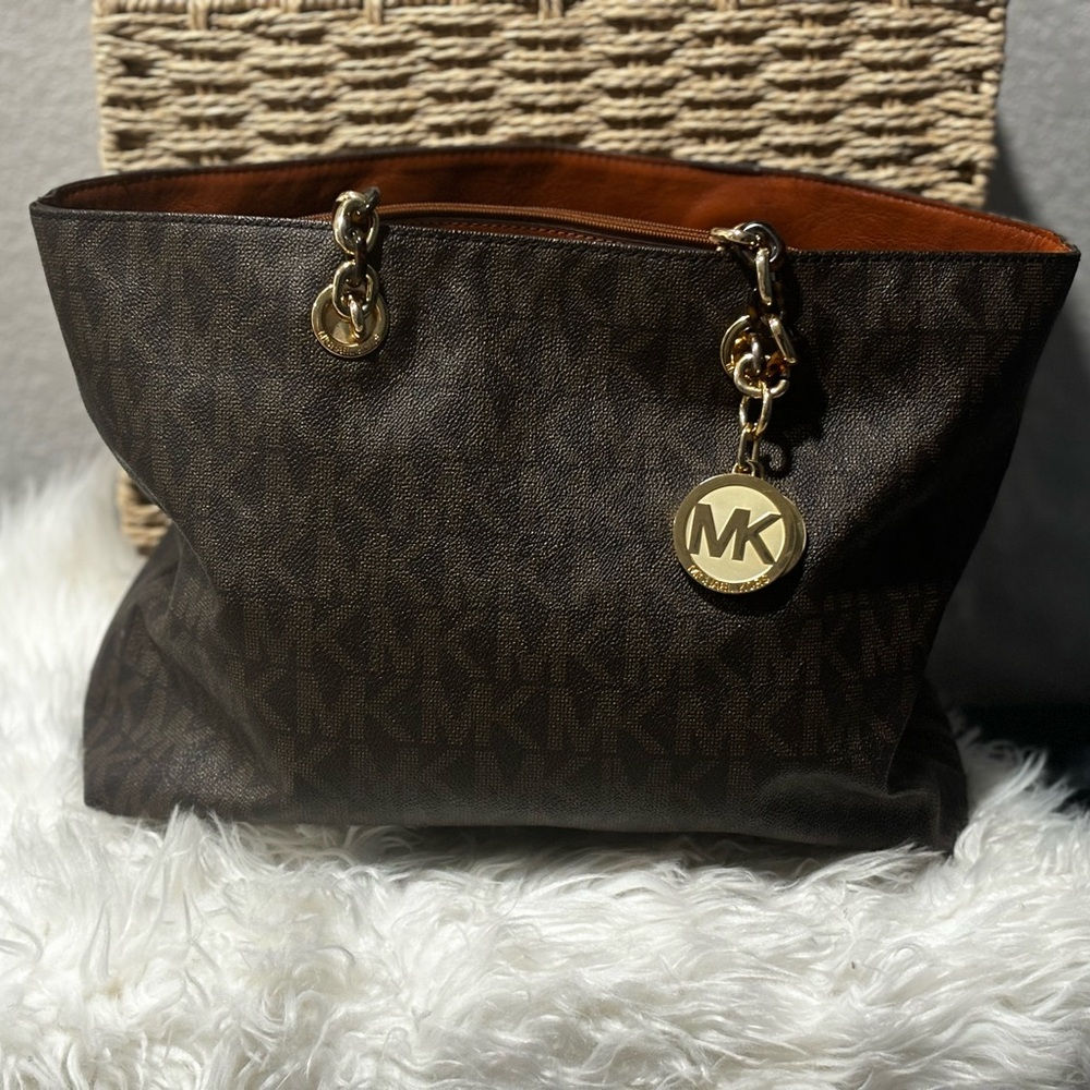 Michael Kors large brown logo tote bag.